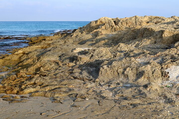 Fototapeta na wymiar Rocks on the shores of the Mediterranean Sea in northern Israel.