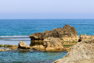 Rocks on the shores of the Mediterranean Sea in northern Israel.