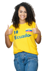 Laughing young woman from Ecuador with yellow football jersey