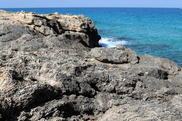 Rocks on the shores of the Mediterranean Sea in northern Israel.