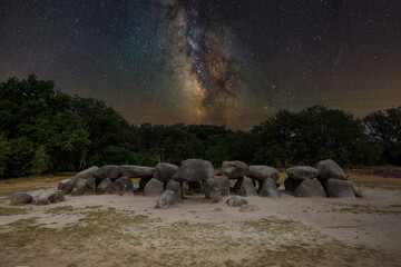 Landscape at night with dolmen, D53, in the province of Drenthe, the Netherlands with a background...