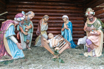 Christmas Manger scene with figures including Jesus, Mary, Joseph, sheep and magi.