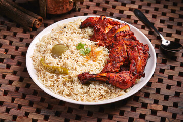 Arabian Chicken Lamb Mandi or biryani served in dish isolated on table side view of middle east food