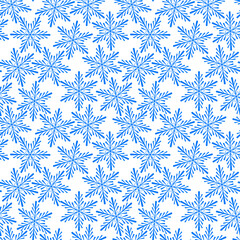 Seamless pattern. Blue snowflakes on a white background.