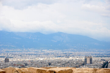 Fototapeta na wymiar Panoramic view of Athens against the mountains 
