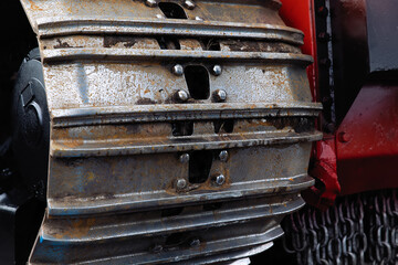 The caterpillar of a tractor or tracked vehicle.