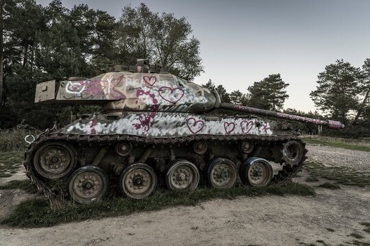 Scrap battle tank on a military training area.