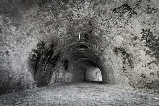 Underground tunnel in a historic castle.