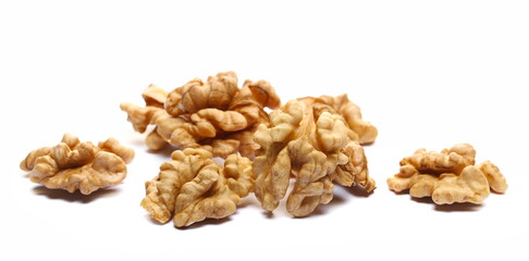 Walnuts pile isolated on white  