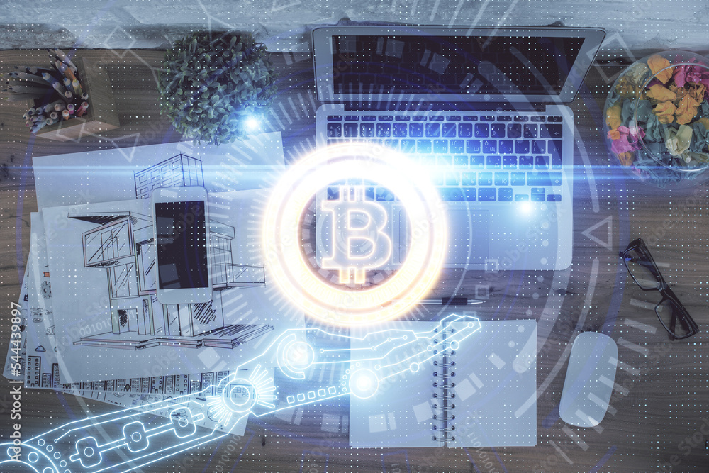 Poster Blockchain theme hologram drawings over computer on the desktop background. Top view. Double exposure.