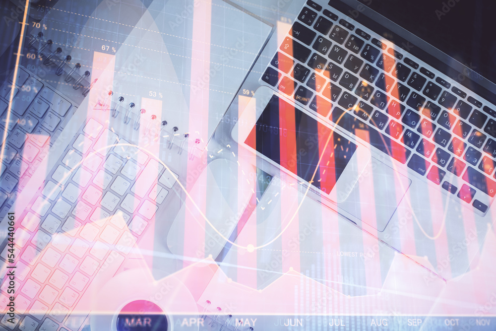Poster Financial market graph and top view computer on the desktop background. Multi exposure. Investment concept.