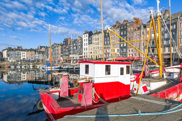 Honfleur, beautiful city in France, the harbor, houses on the quay 
