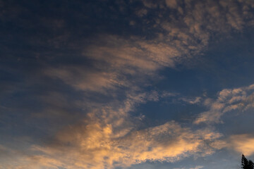 Naklejka na ściany i meble Cloudscape. sky with white clouds before sunset. Itaipava, Rio de Janeiro, Brazil