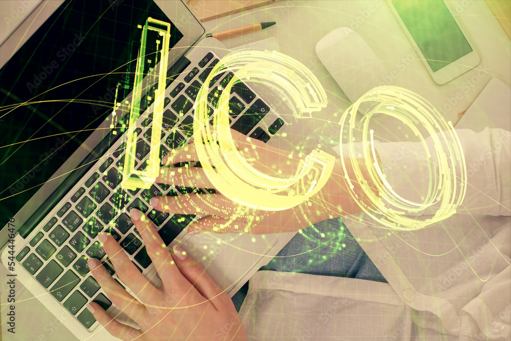 Poster double exposure of woman hands working on computer and blockchain theme hologram drawing. top view. 