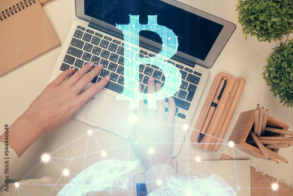 Poster double exposure of woman hands working on computer and blockchain theme hologram drawing. top view. 
