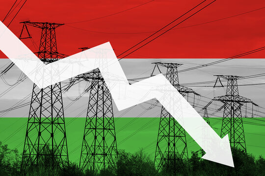 Power line and flag of Hungary. Energy crisis. Concept of global energy crisis. Decreased electricity generation. Graph arrow is down - Powered by Adobe