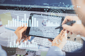 Double exposure of man's hands holding and using a phone and financial chart drawing. Market analysis concept.