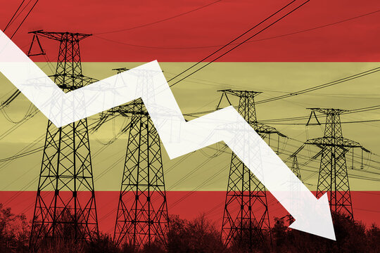 Power line and flag of Spain. Energy crisis. Concept of global energy crisis. Decreased electricity generation. Graph arrow is down