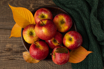 Apples on a wooden table. Top view.