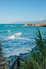 Obraz premium Blue and turquoise water at the sea. Vacations at the beach. Beautiful beaches in Greece