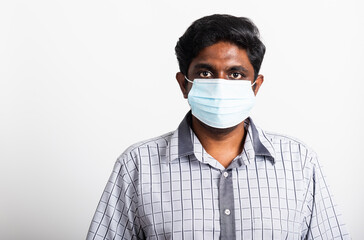 Asian happy portrait young black man wearing face mask protective from virus coronavirus epidemic or air pollution looking camera, studio shot isolated on white background, stop COVID-19 concept