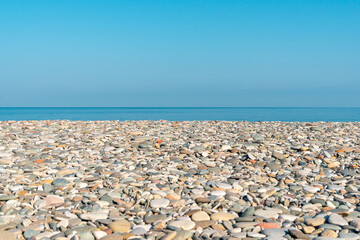 Beautiful pebble beach landscape in Batumi, sunny day