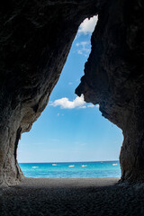 View of the sea from a cave in Cala Luna