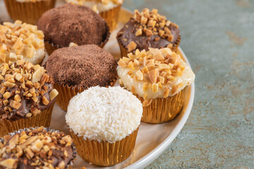 Brigadeiro is a common Brazilian dessert. Delicious chocolate candy Brigadeiro on a table