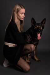 Young woman with german shepherd dog