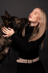 Young woman with german shepherd dog