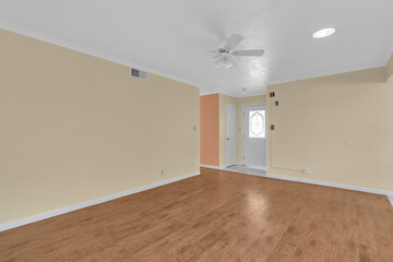 Living room with fan on ceiling