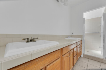 Bathroom with shower and sink