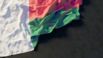 Flag of Madagascar with beautiful lighting and colors. Isolated with dark background and copy space. 