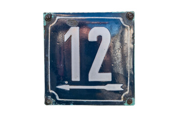 Weathered grunge square metal enameled plate of number of street address with number 12 isolated on...