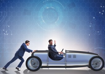 Businessman car pushing in teamwork concept