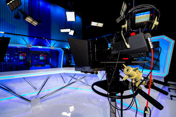 television studio with television equipment. lighting and filming equipment in a television studio...