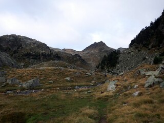 Pyrenees, Carros de Foc hiking tour. A week long hike from hut to hut on a natural scenery with lakes, mountains and amazing flora and fauna.
