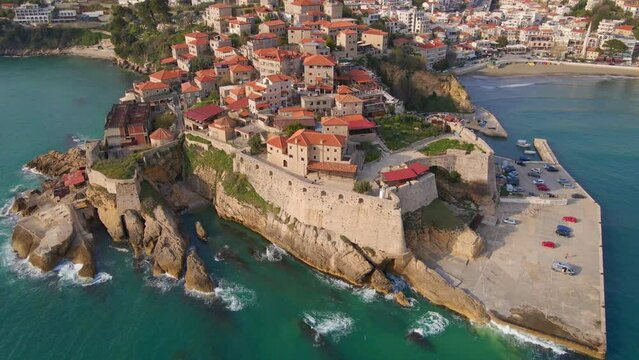 Aerial video. Slowmotion shot of the old town of the city of Ulcinj, a coastal town in the southern part of Montenegro. Travel destinations of Montenegro
