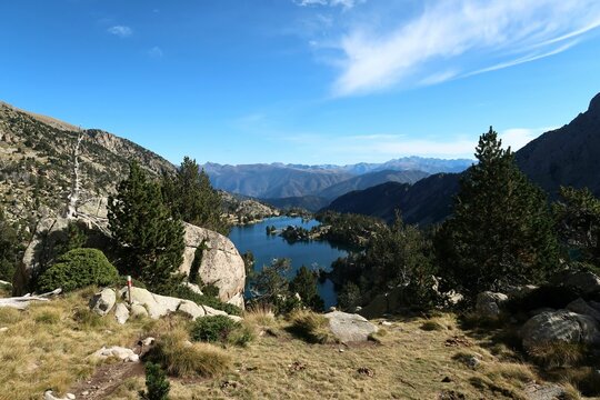 Pyrenees, Carros de Foc hiking tour. A week long hike from hut to hut on a natural scenery with lakes, mountains and amazing flora and fauna.
