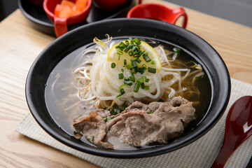 Warmly cooked beef rice noodles