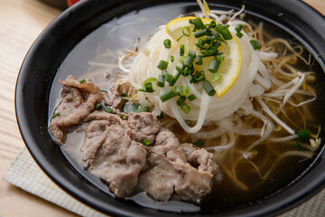 Warmly cooked beef rice noodles