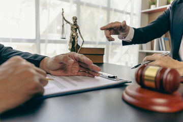 Businessmen and lawyers discuss contract documents. Treaty Law. business contract and legal...