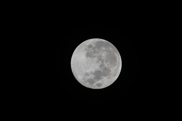 Full moon over black