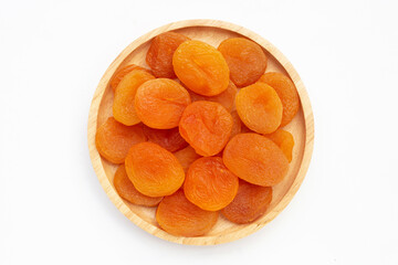 Dried apricots on white background.