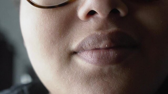 Beautiful natural Lips of a black woman close up.