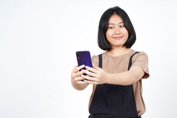 Take a Selfie using Smartphoneof Beautiful Asian Woman Isolated On White Background