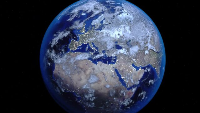 Zoom out of Lithuania through clouds to see the Earth from space.