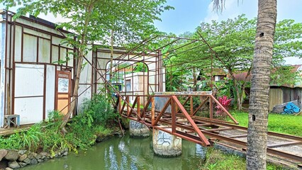 Fototapeta premium ancient Railroad bridge over the river