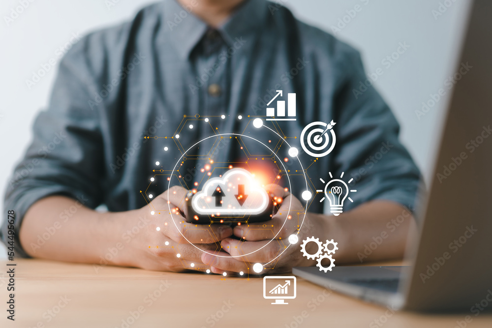 Poster Handholding virtual cloud computing on a smartphone with world and technology items such as upload and downloading Cloud technology management and big data include business strategy, customer service