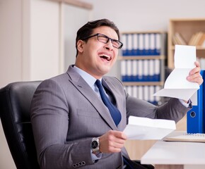 Businessman receiving letter in the office